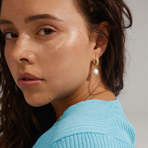 Örhängen med stenar/pärlo